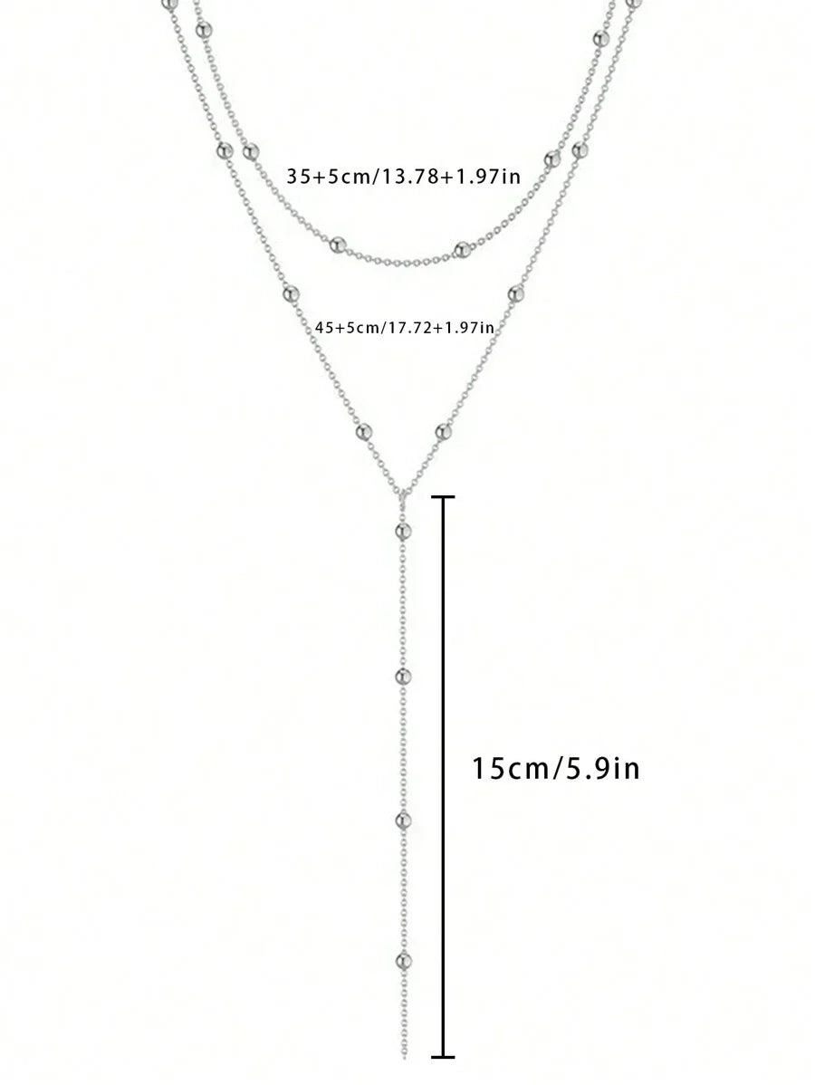 AuroraY – Fijne Y-Halsketting met Gouden Glans