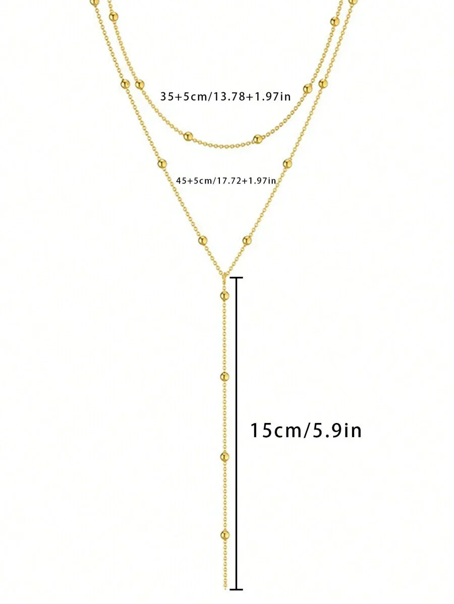 AuroraY – Fijne Y-Halsketting met Gouden Glans