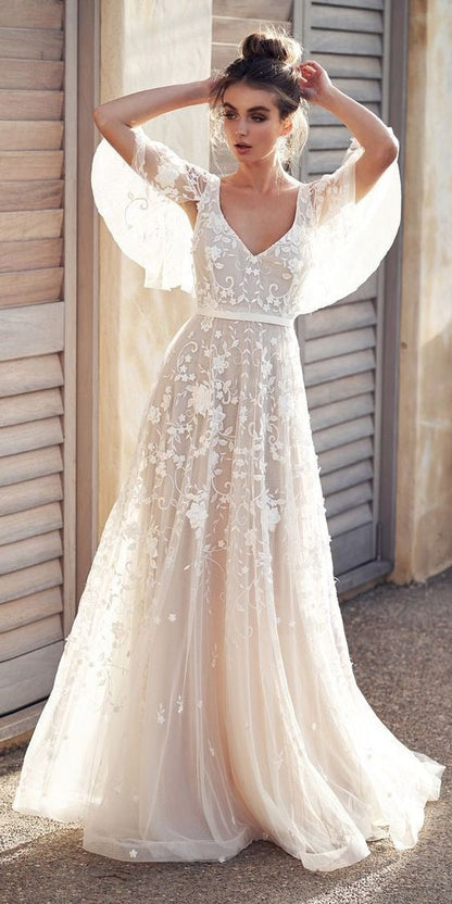 Aurora Bridal Gown – Tijdloze Romantiek in Parelwit