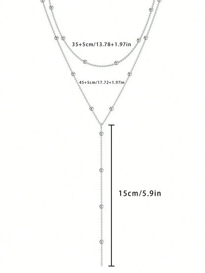 AuroraY – Fijne Y-Halsketting met Gouden Glans
